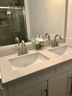 Combined shower/tub, hair dryer, towels, soap