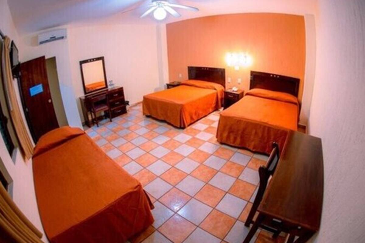 traditional triple room, multiple beds, ensuite | down duvets, desk, free wifi