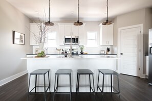 Fridge, microwave, oven, stovetop - Design-Forward East Nashville Townhome • 10 Min to Broadway | Rhett (Nashville)
