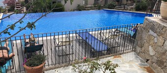 Stella marina apartment facing port and beach, swimming pool.