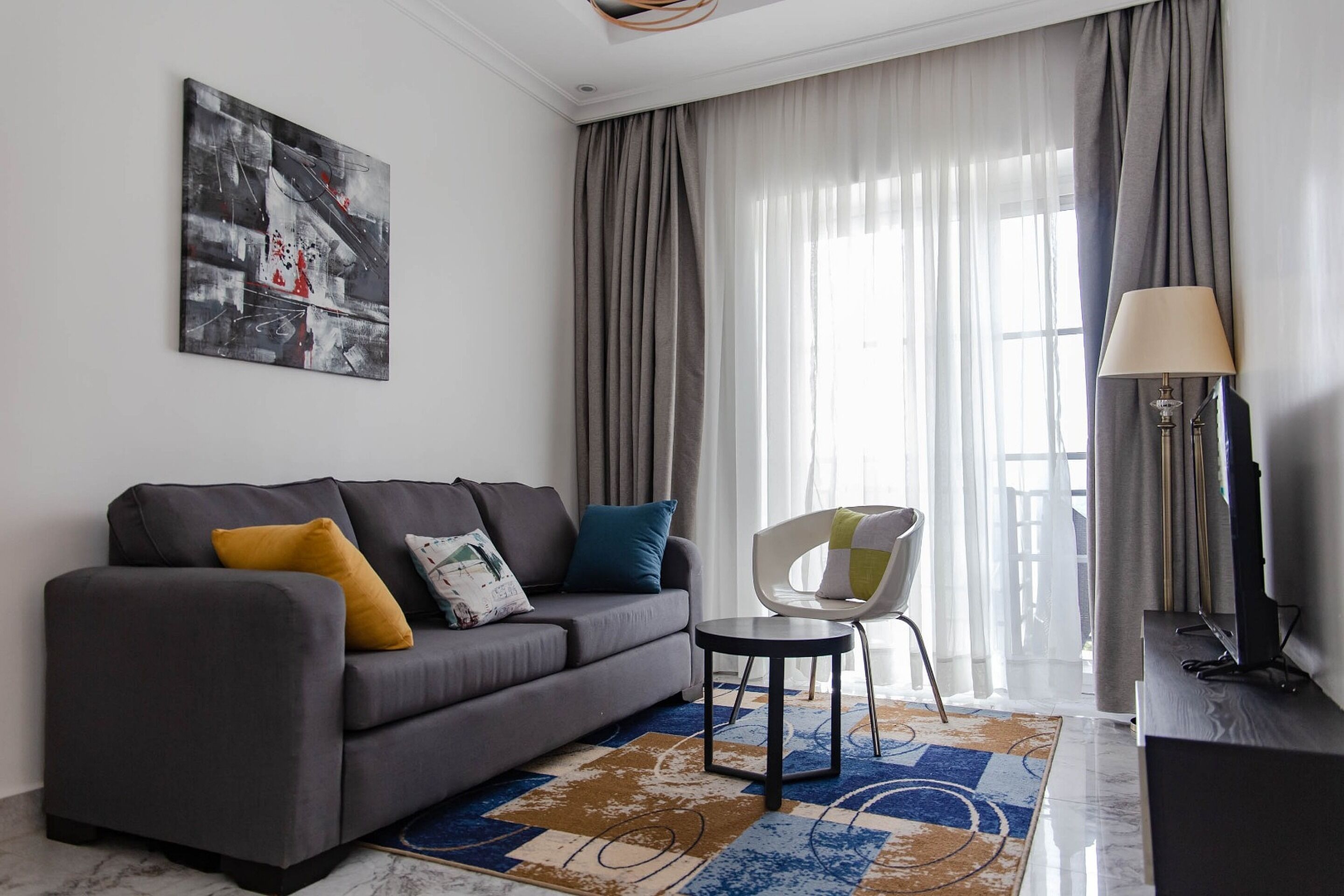 Apartemen, 1 kamar tidur | Area keluarga | Televisi layar datar 42-inci dengan saluran TV kabel dan TV