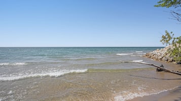 On the beach, sun-loungers, beach towels