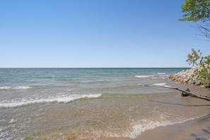 On the beach, sun-loungers, beach towels