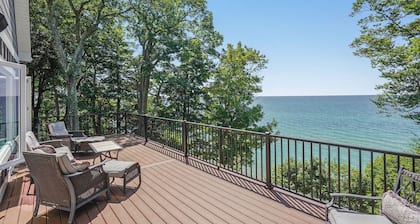 NEW & IMPROVED Spectacular beach front home on Lake Michigan