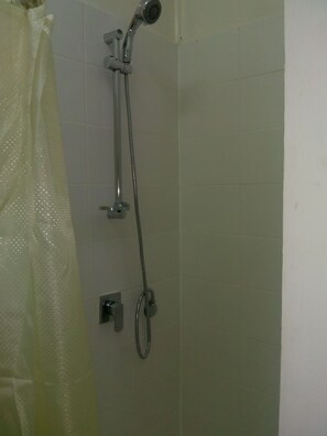 Family Apartment | Bathroom | Shower, rainfall showerhead, free toiletries, towels