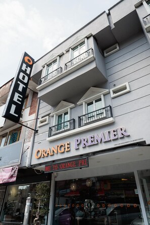 A hotel named 'Orange Premier' with a balcony and a digital display. - Orange Premier Hotel Taman Segar (Kuala Lumpur)