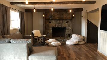 Smart TV, fireplace, video games, foosball