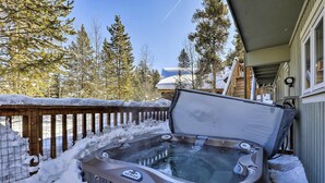A hot tub in a snowy outdoor area with a wooden deck and snow-covered ground. - Hot Tub Relaxation: Breck Gem 3 Mi to Skiing! (Breckenridge)