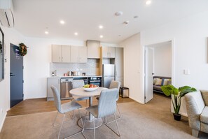 Design Apartment | Living area | 49-inch LED TV with satellite channels, TV