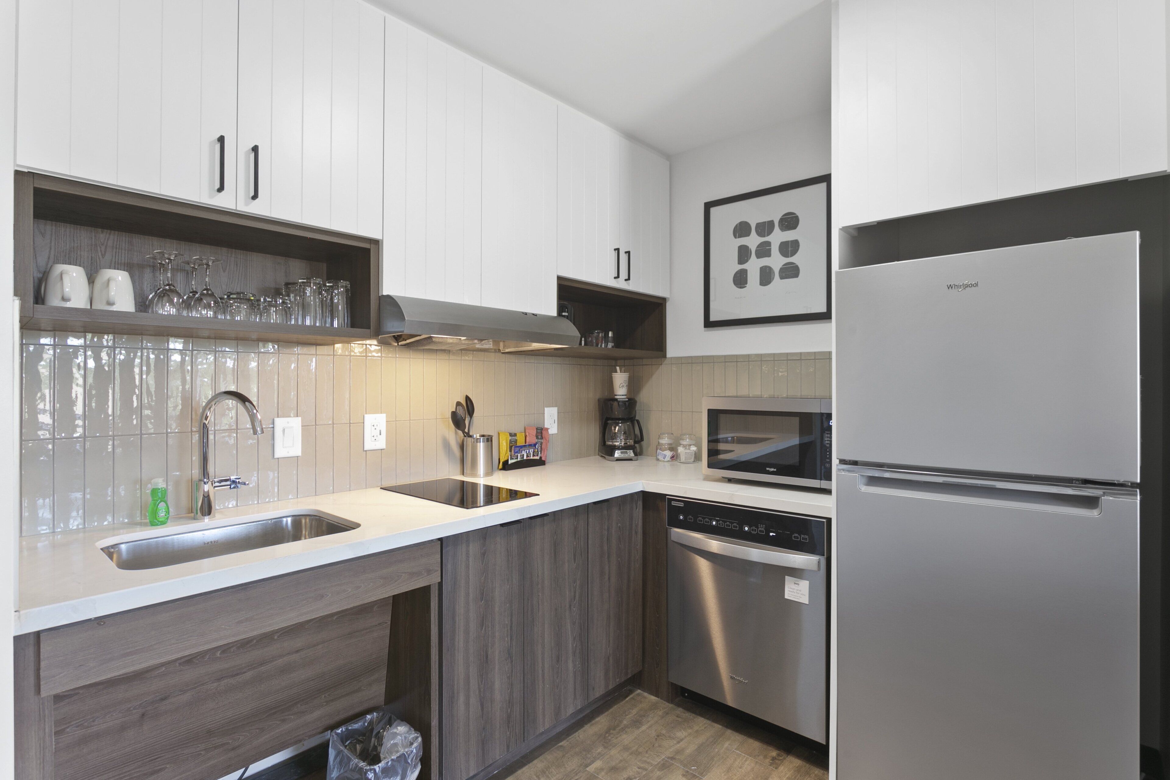 full-sized fridge, microwave, dishwasher, coffee/tea maker