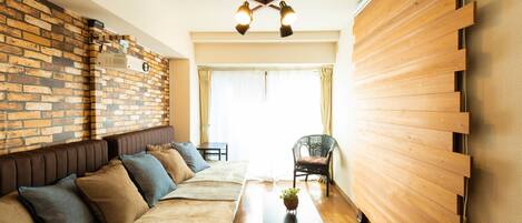 Appartement (Private Room) | Woonruimte | Flatscreentelevisie en een dvd-speler