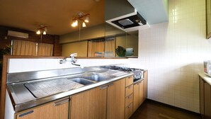 Apartment, 3 Bedrooms | Private kitchenette | Fridge, microwave, stovetop, electric kettle - Uenoya Apt (Naha)
