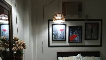 Rm 105 at Liezel's B&B, 1- 3 people | Individualmente decorados, individualmente mobiliados, roupa de cama