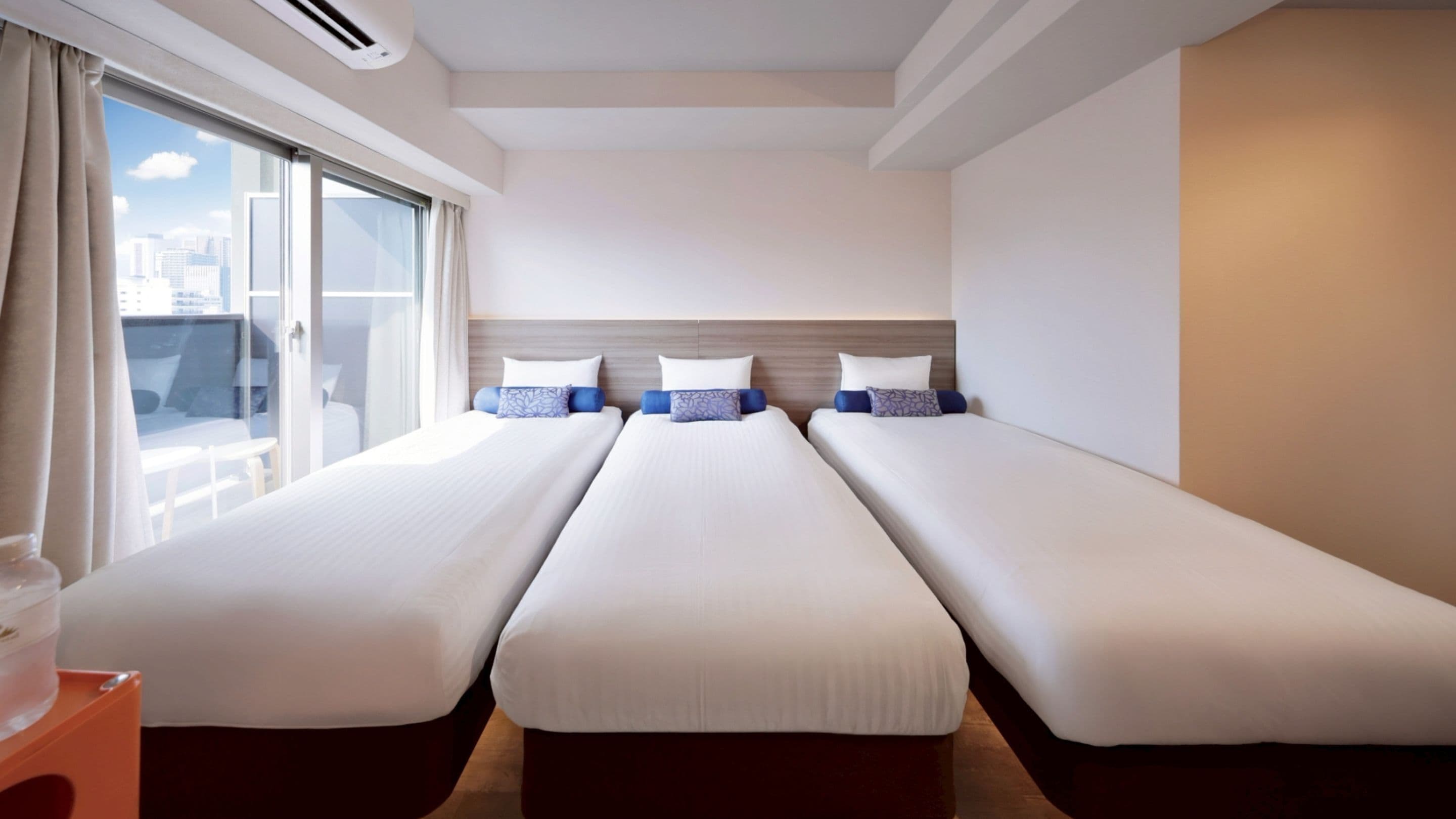 Triple Room | Down comforters, desk, laptop workspace, blackout drapes