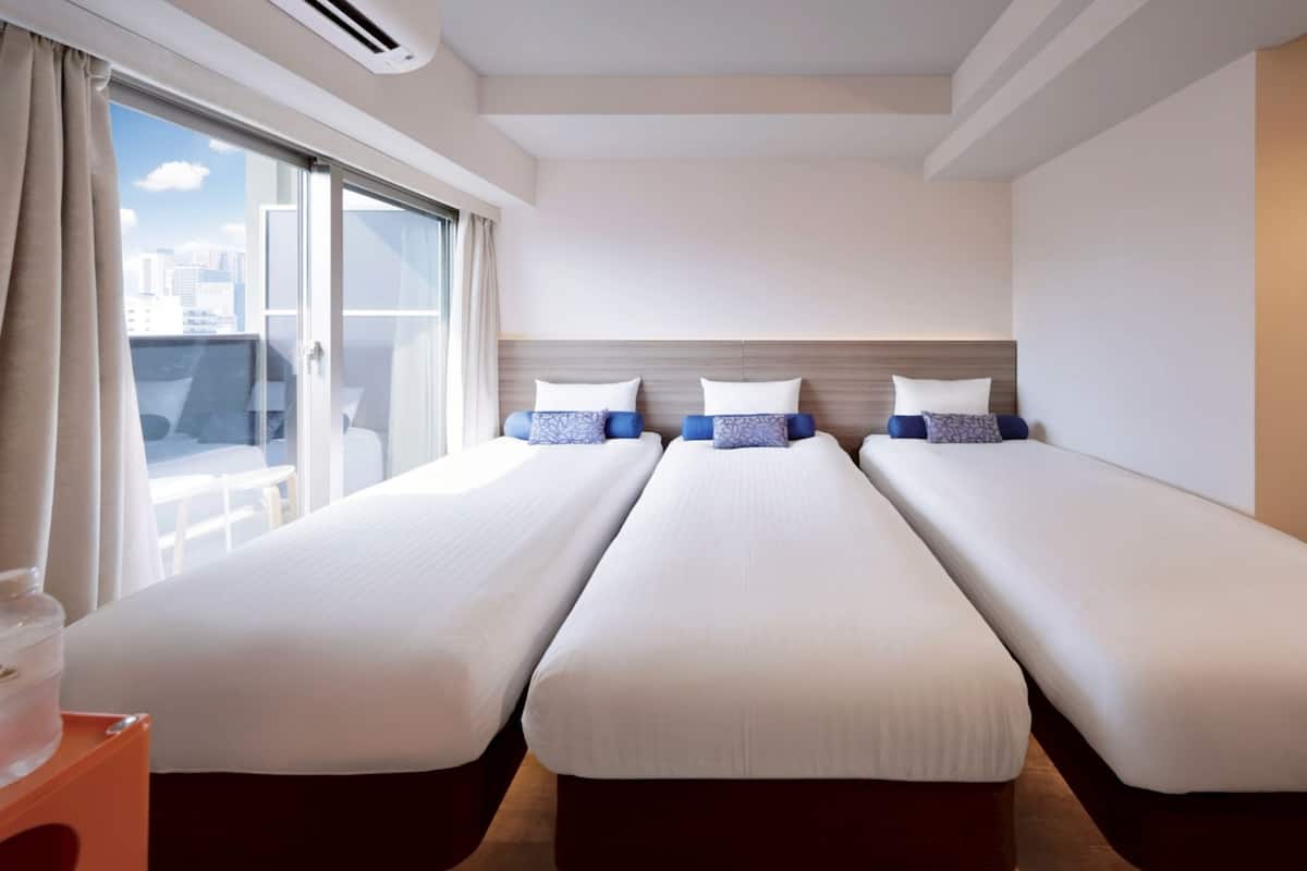 Triple Room | 1 bedroom, down comforters, desk, laptop workspace