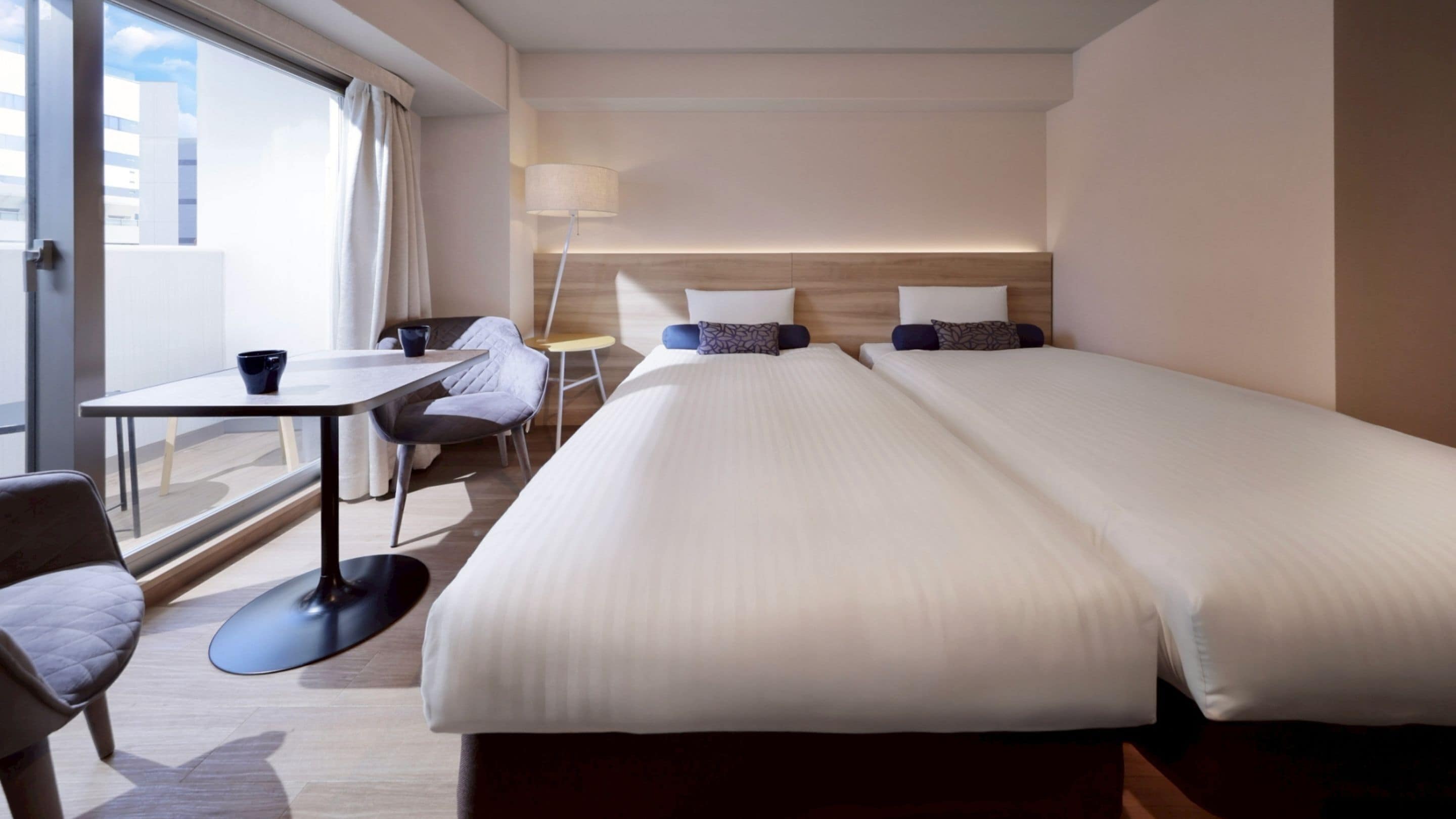 Down comforters, desk, laptop workspace, blackout drapes