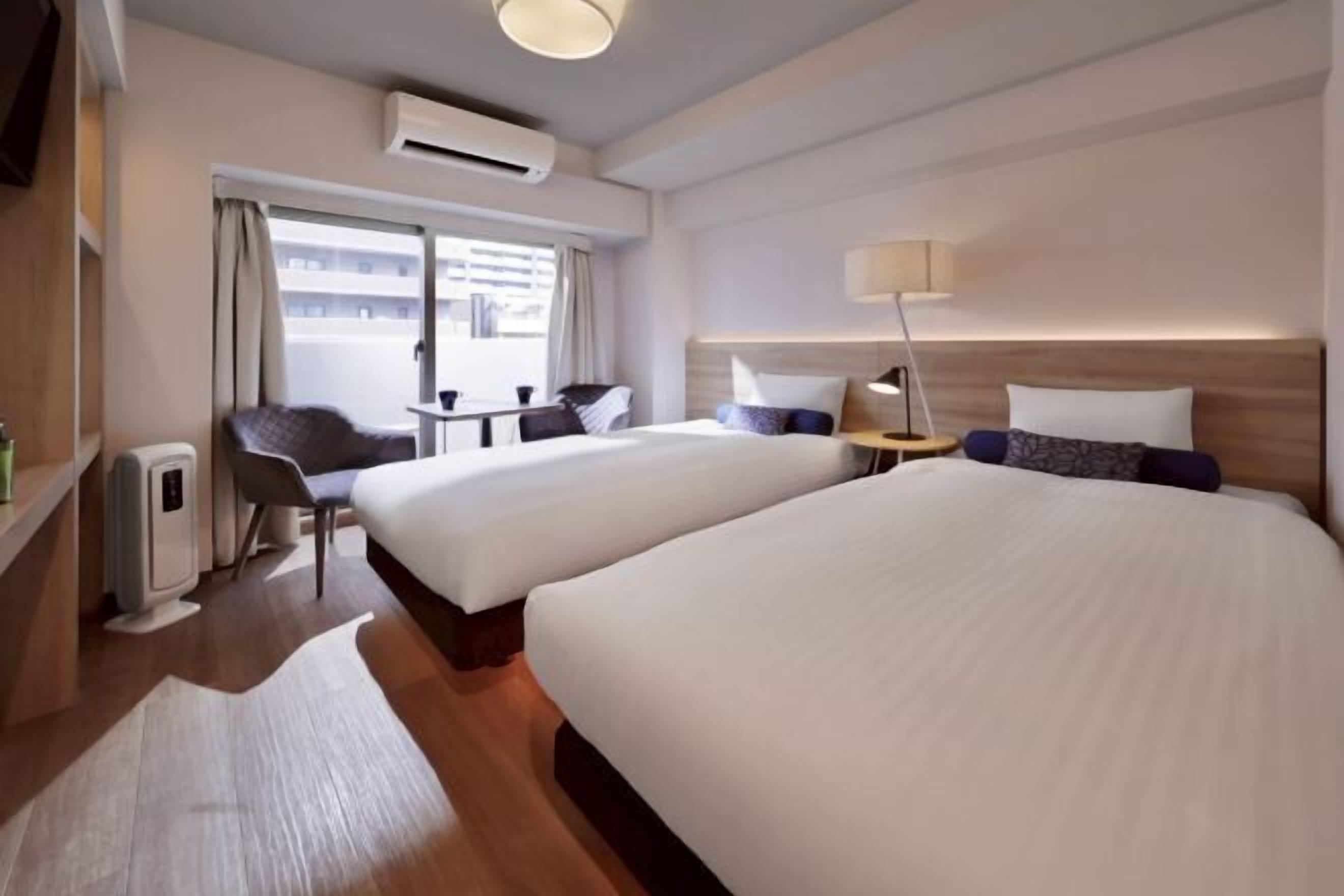 Down comforters, desk, laptop workspace, blackout drapes