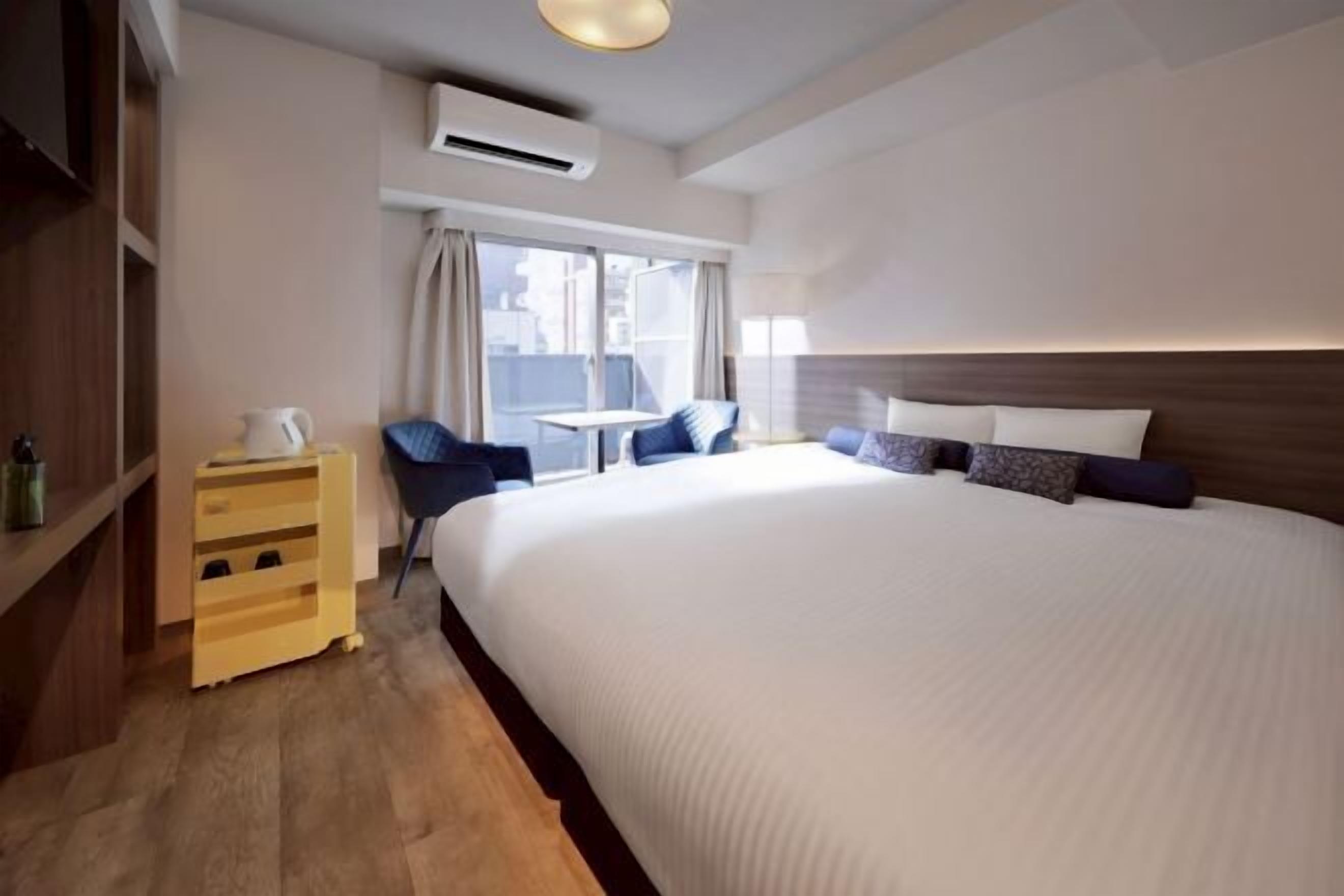 Down comforters, desk, laptop workspace, blackout drapes