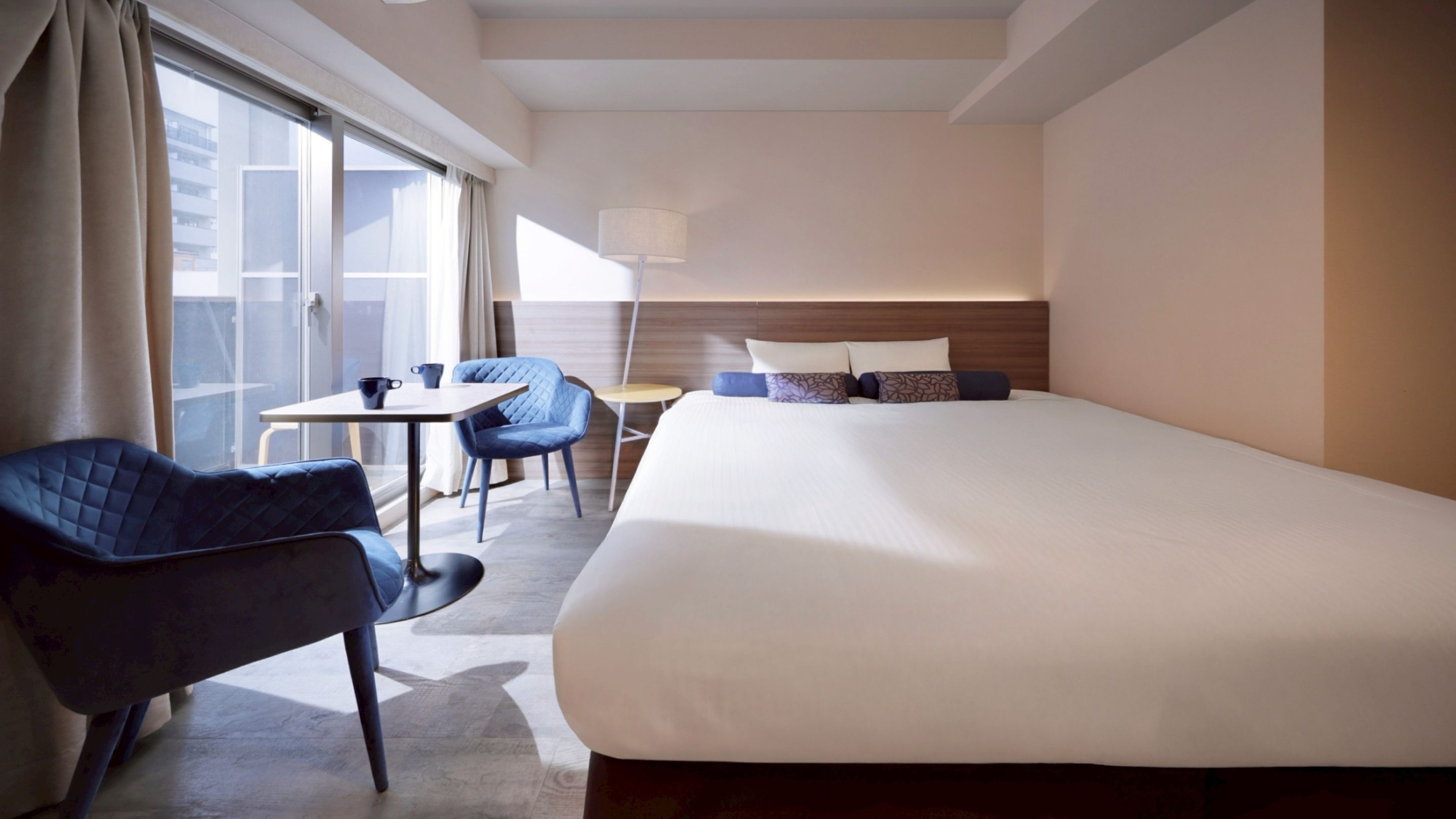 Down comforters, desk, laptop workspace, blackout drapes