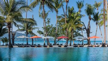 On the beach, white sand, free beach shuttle, beach bar