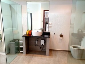 Basic Villa | Bathroom | Shower, free toiletries, hair dryer, slippers