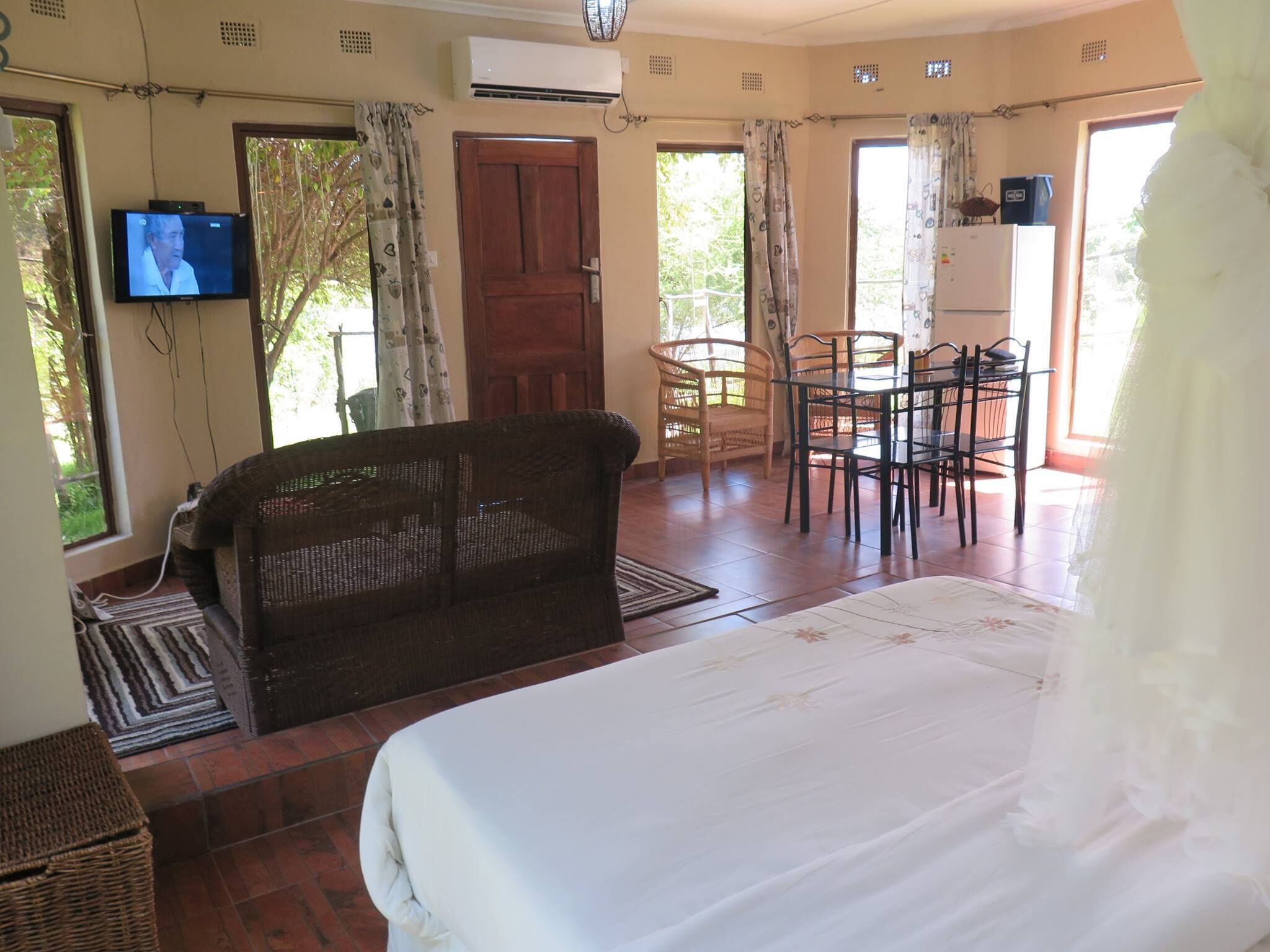 Honeymoon Cottage | Living area | 24-inch flat-screen TV with satellite channels, TV