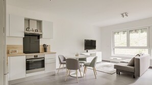 Apartamento conforto | Área de estar | TV de tela plana, Netflix, serviços de streaming