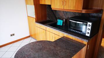 Comfort Apartment | Private kitchen | Fridge, microwave, oven, stovetop