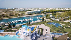 A resort with a water park, marina, and beachfront views. - Camping de l'Espiguette (Le Grau-Du-Roi)