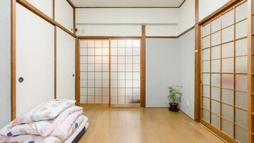 Apartment, 2 Bedrooms | Desk, blackout drapes, iron/ironing board, free WiFi
