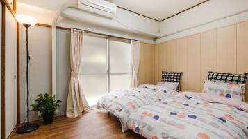 Apartment, 2 Bedrooms | Desk, blackout drapes, iron/ironing board, free WiFi
