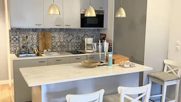 Microones, forn, placa de cuina i rentaplats