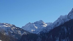 A mountain landscape with snow-covered peaks and a clear sky. - Double room new (type A) Z-NR. 4 - Greber Christine - Bed and breakfast (Schoppernau)