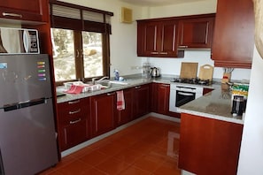 Villa, 3 Bedrooms, Non Smoking, Kitchen | Private kitchen | Full-sized fridge, microwave, oven, stovetop - 3 Bedroom Sea View Villa Cara (Koh Samui)