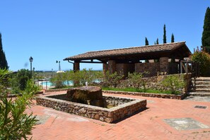 Property grounds - Villa in charming stone village with swimming pool, tennis, in the countryside near the sea and services.  (campiglia marittima)