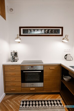 Suite estudio | Cocineta privada | Refrigerador, horno, parrilla de estufa y lavavajillas 