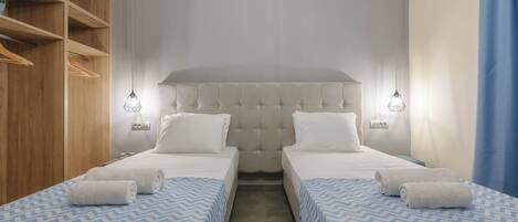 Triple Room, City View | In-room safe, iron/ironing board, free WiFi, bed sheets