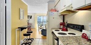 Fridge, microwave, oven, stovetop - Lovely 1-bedroom condo with free WiFi, cute coastal decor, and an outdoor pool located midtown and just steps to the beach! (OCEAN CITY)