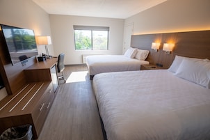 Down comforters, desk, laptop workspace, blackout drapes