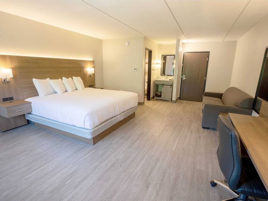 Down duvets, desk, laptop workspace, blackout curtains