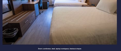 Down comforters, desk, laptop workspace, blackout drapes