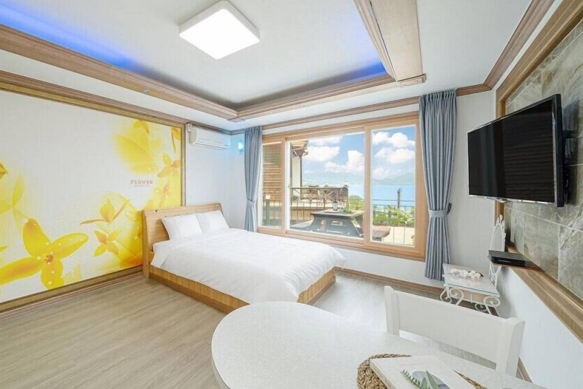 Room (Yellow flower) | Free WiFi, bed sheets