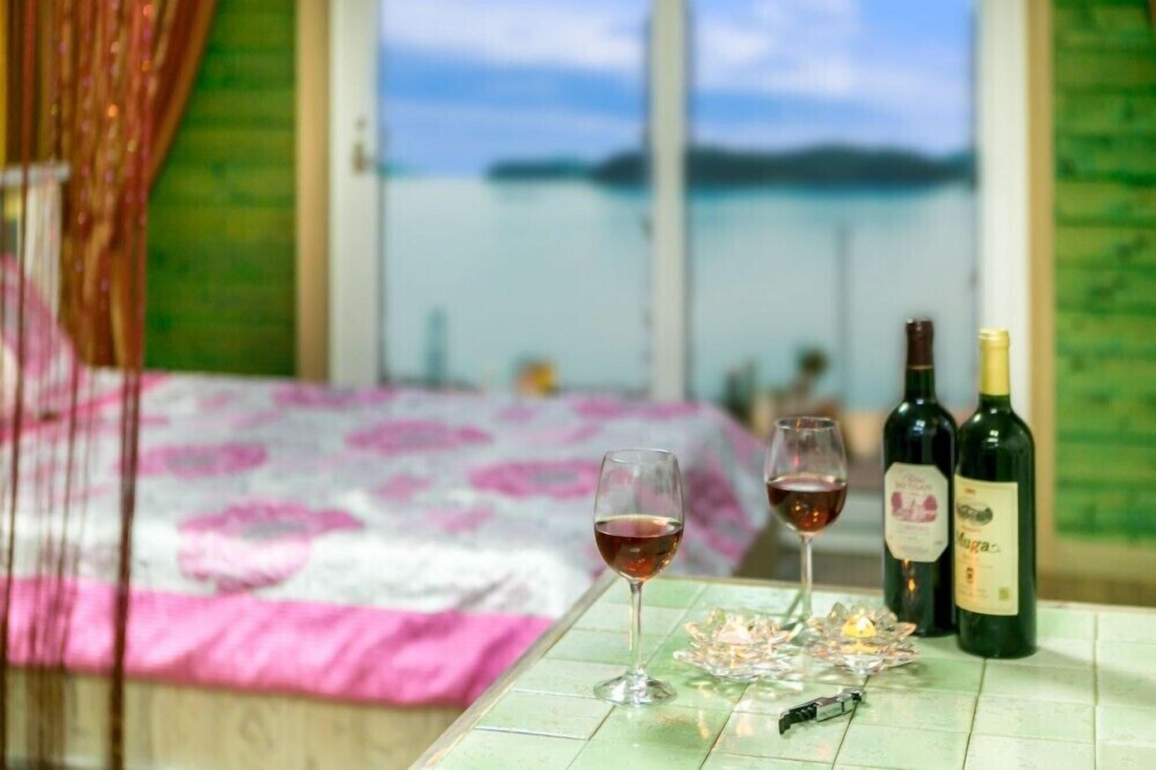 Quarto (Wave (2nd floor)) | Individualmente mobiliados, Wi-Fi de cortesia, roupa de cama