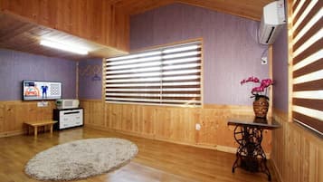 Habitación (Jangmi) | Wifi gratis y ropa de cama