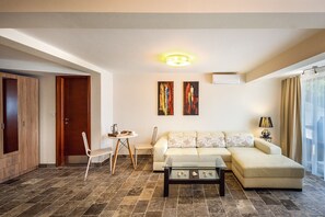 Apartment | Living room | Flat-screen TV, toys - Apart Hotel Santorini (Krasici)