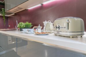 Apartment, 2 Bedrooms | Coffee and/or coffee maker - Family Apartments Verdi (Trento)