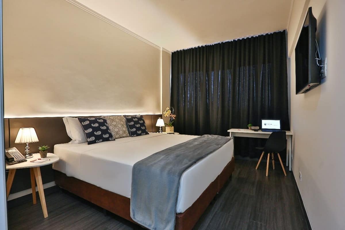 Standard Double Room, 1 King Bed | Minibar, in-room safe, desk, laptop workspace