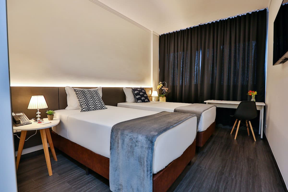 Standard Room, 2 Single Beds | Minibar, in-room safe, desk, laptop workspace