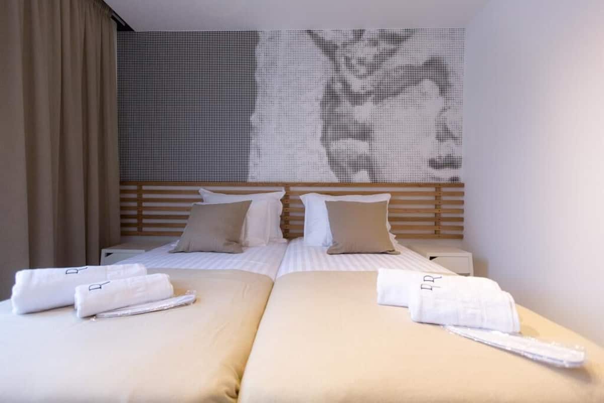 Biancheria da letto di alta qualità, una cassaforte in camera
