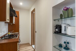 Apartment, 1 Bedroom | Private kitchen | Full-size fridge, stovetop, coffee/tea maker, cookware/dishes/utensils - Via degli Avignonesi (Rome)